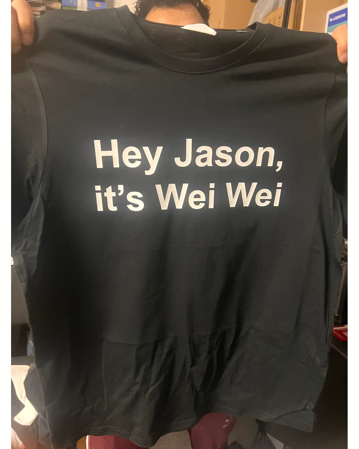 Black T shirt with a large personalised white message
