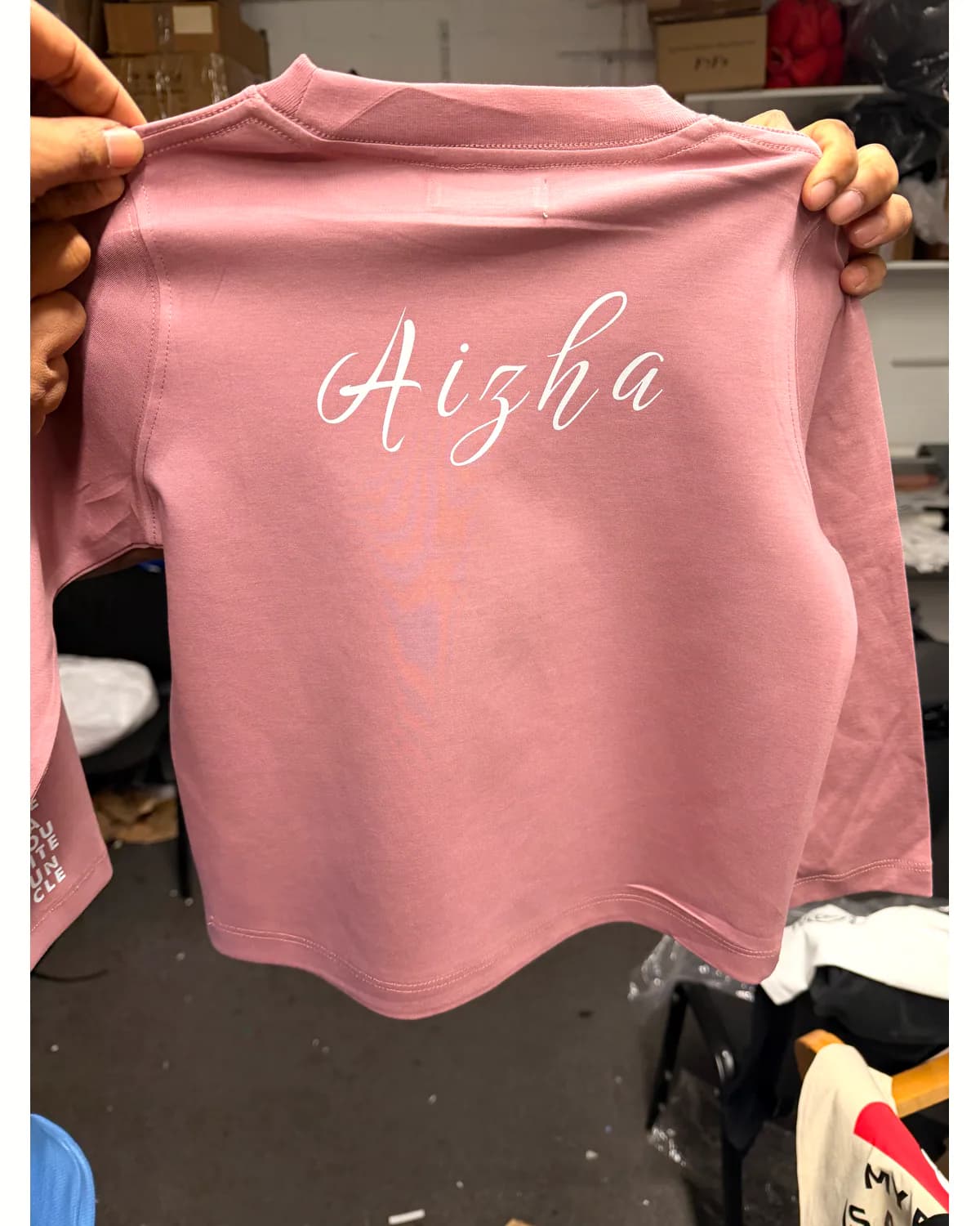 Pink T shirt with a white personalised script name print