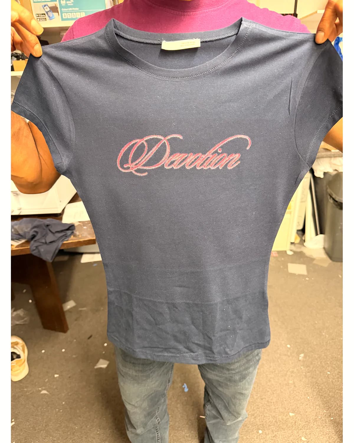Charcoal T shirt with a subtle pink script chest print