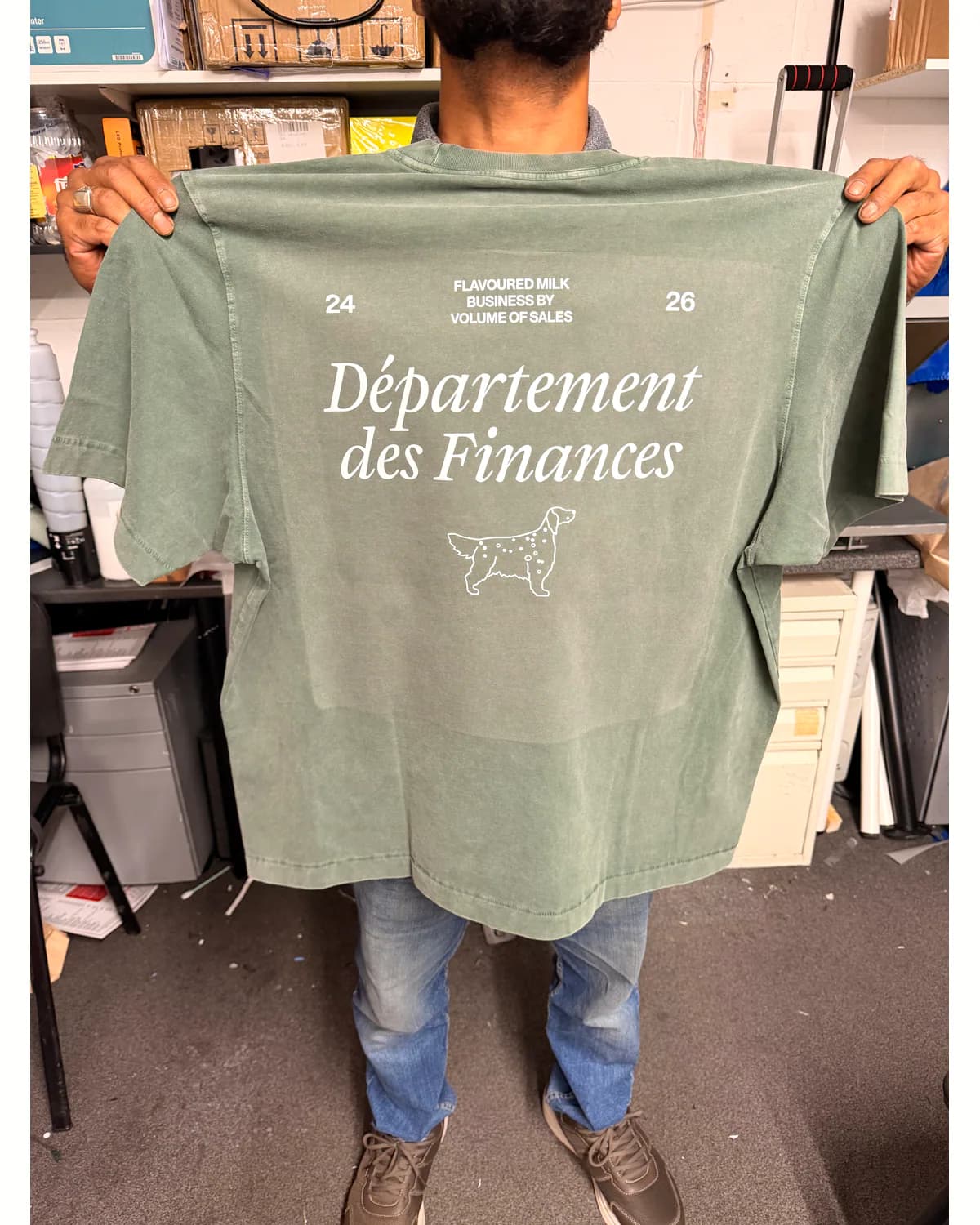Sage green team T shirt with fine white department lettering